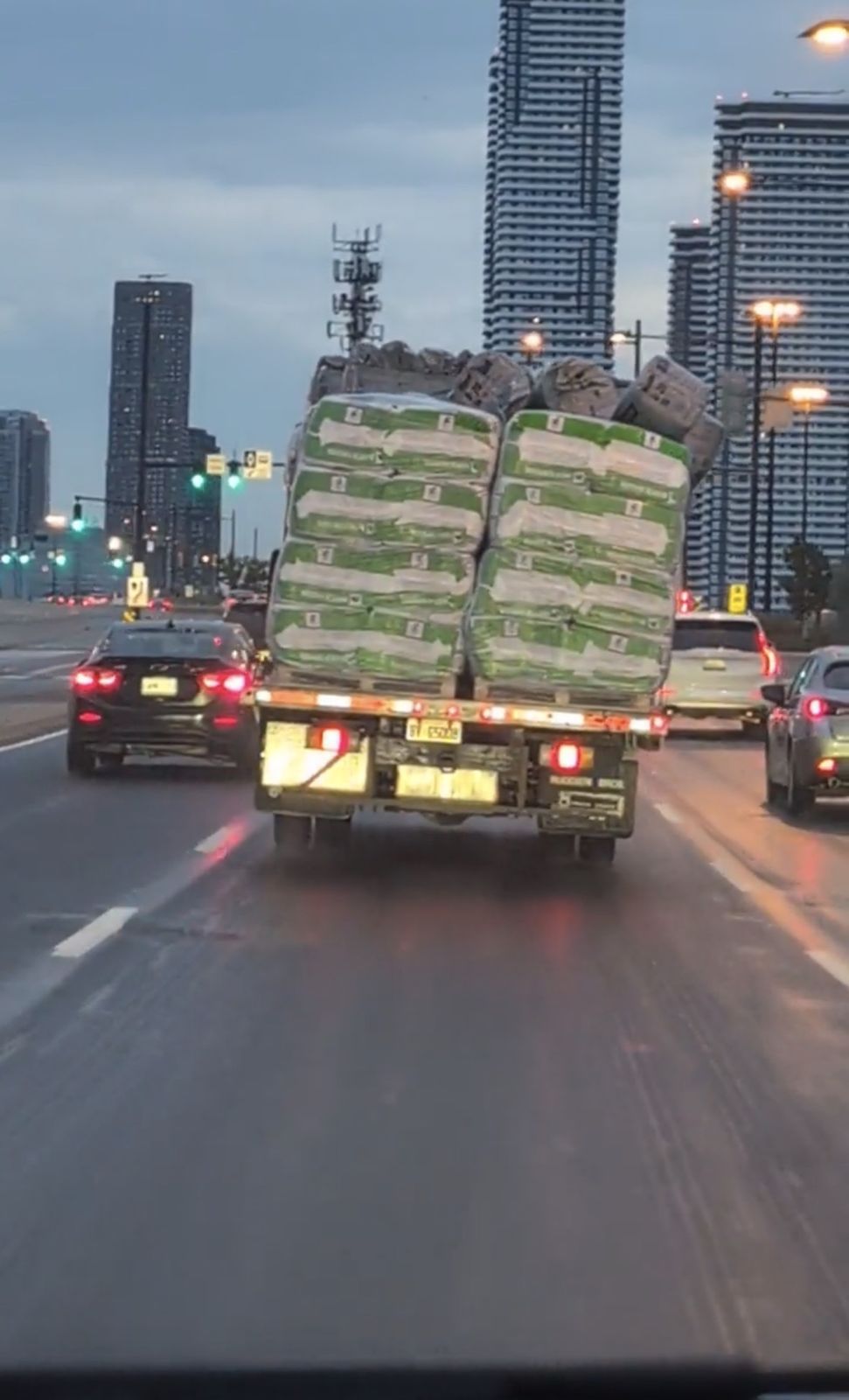 truck carrying a heavily stacked load was spotted travelling Highway 400  — Breaking News Canada